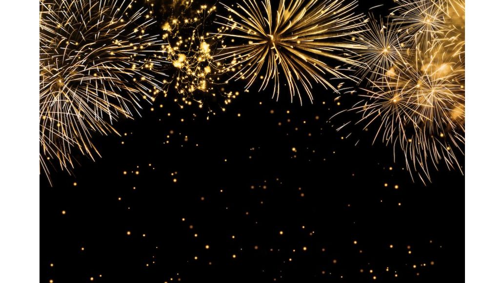 Gold fireworks exploding in the sky