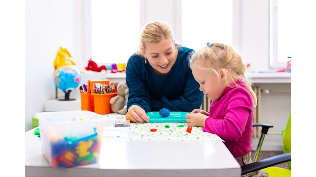 mother helping daughter learn