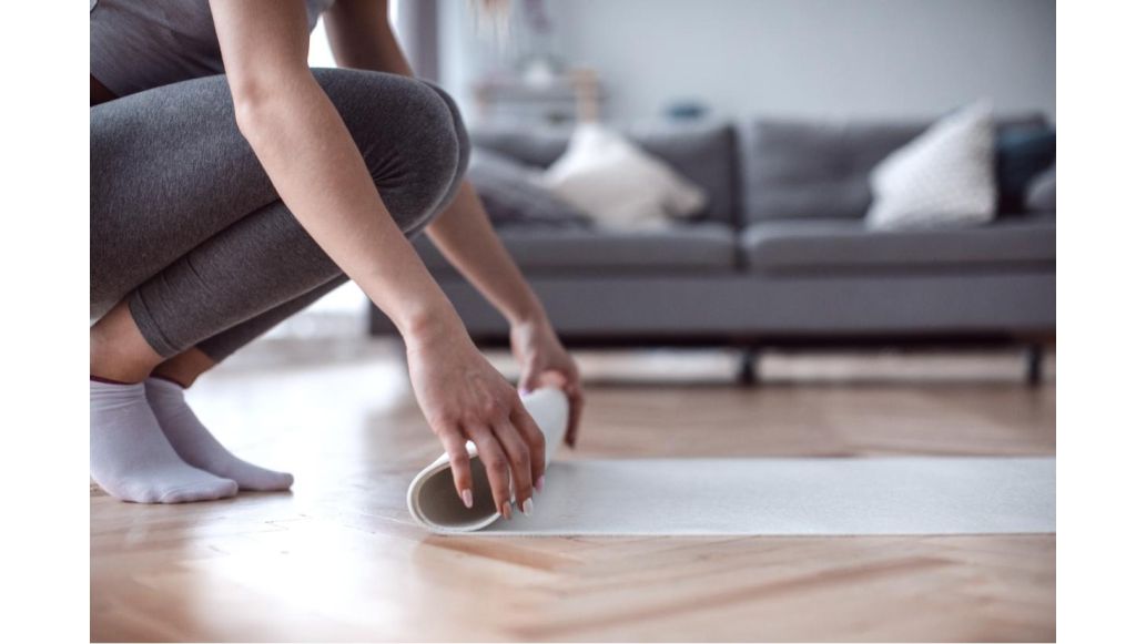 rolling up yoga mat