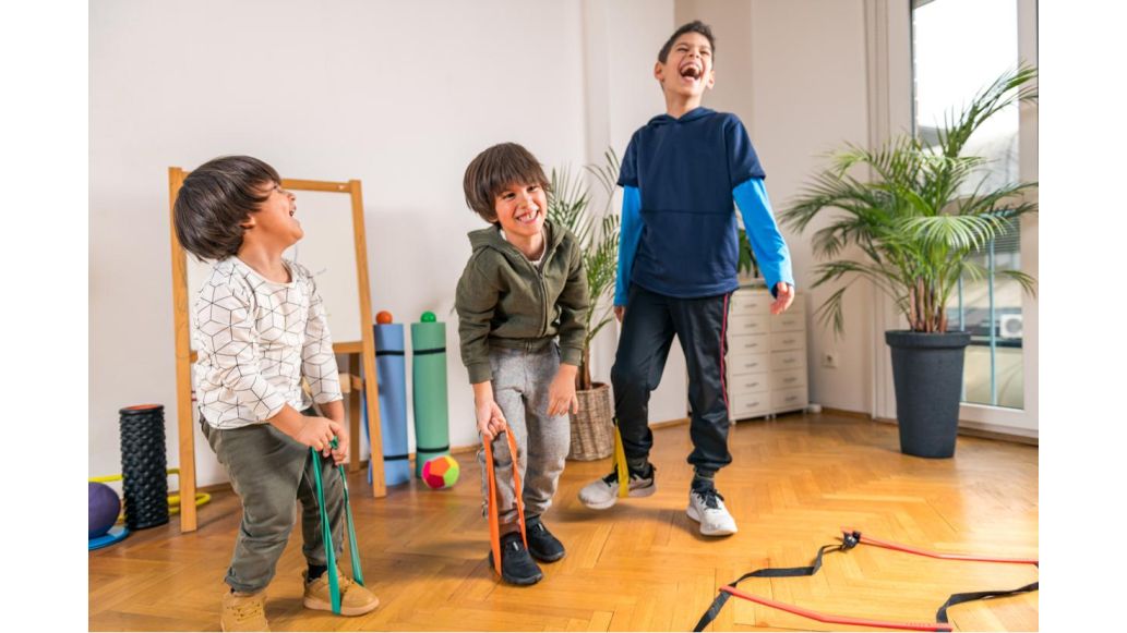 kids laughing with resistance bands