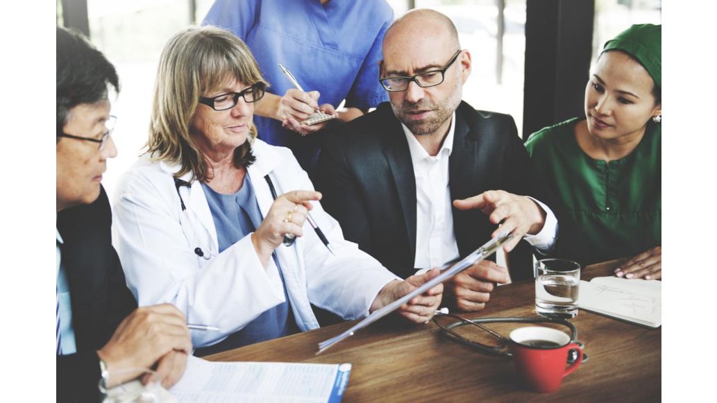 Group of physicians gathered for a meeting