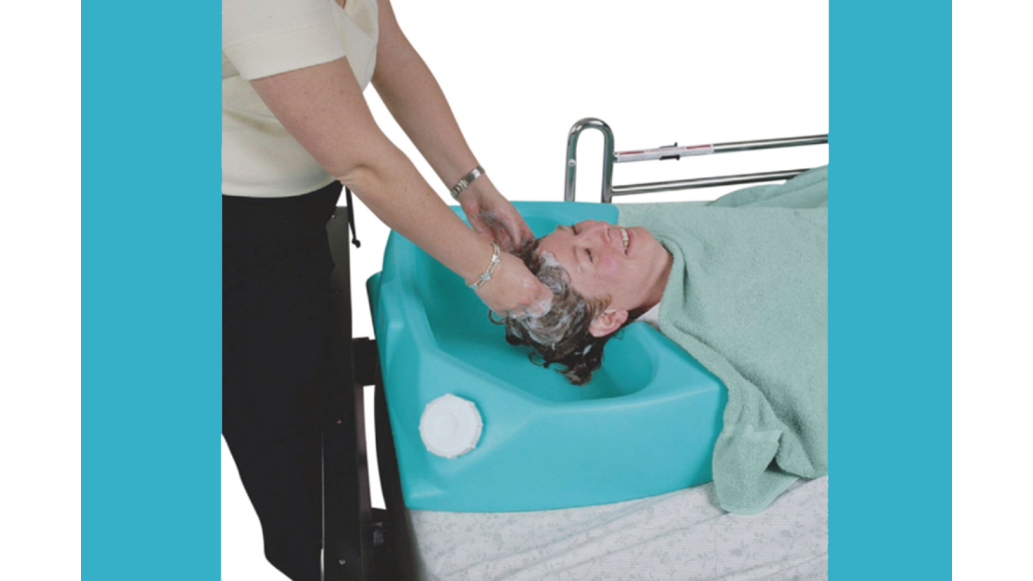 washing patients hair in bed