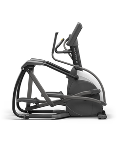 Black and gray Matrix Endurance Elliptical machine seen from the side on a white background.
