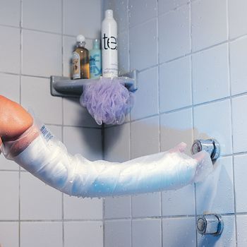 Cast and bandage protector by AquaShield on a full arm in the shower