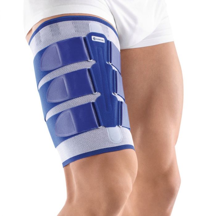 Bauerfeind MyoTrain seen on person's upper thigh