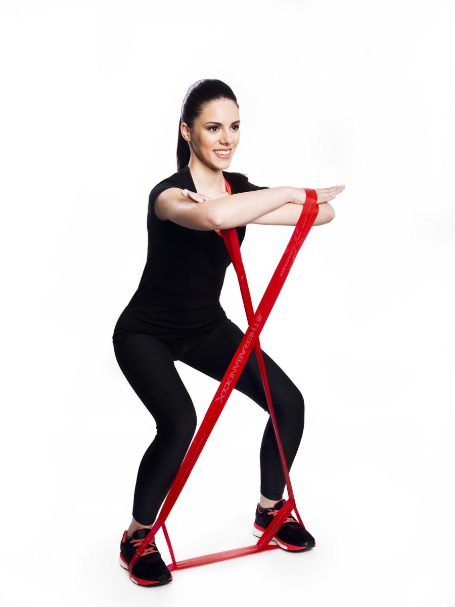 woman using theraband clx loops