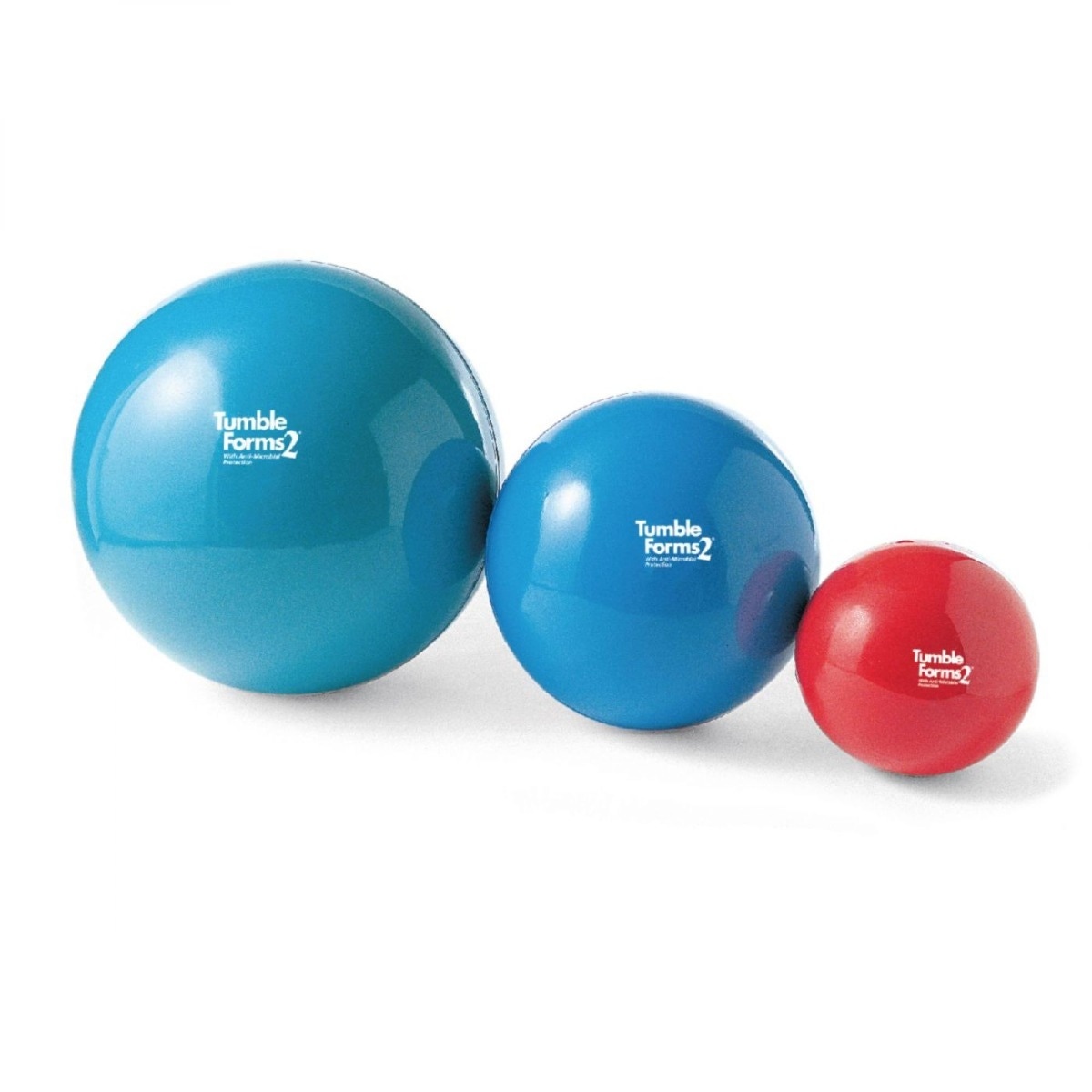 Three different colored balance balls, shown largest to smallest from left to right