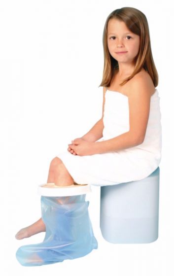 Young girl seated with leg cast and cast cover on