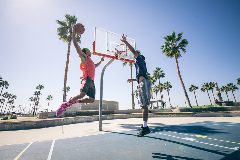 basketball player dunking