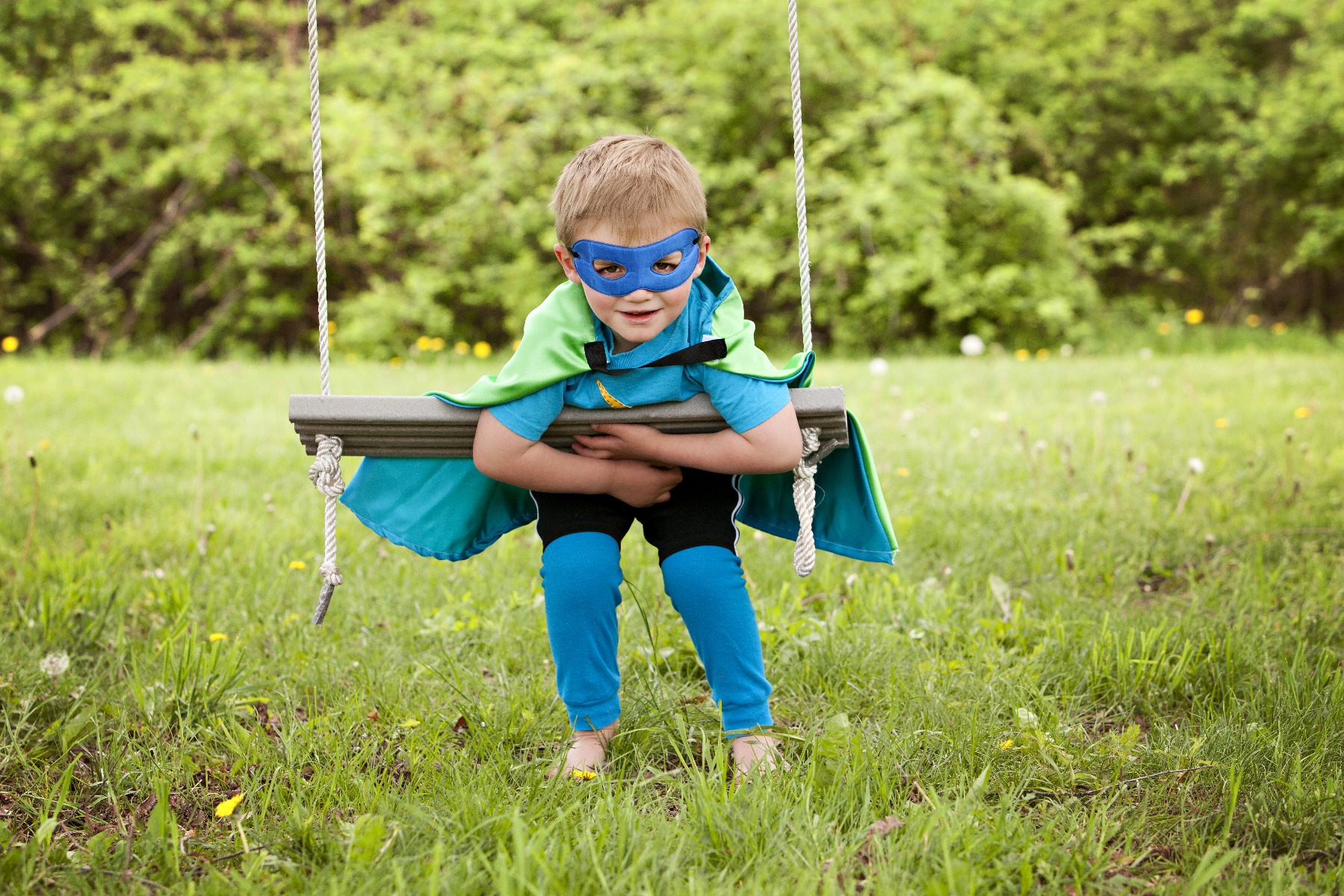 boy in superhero costume