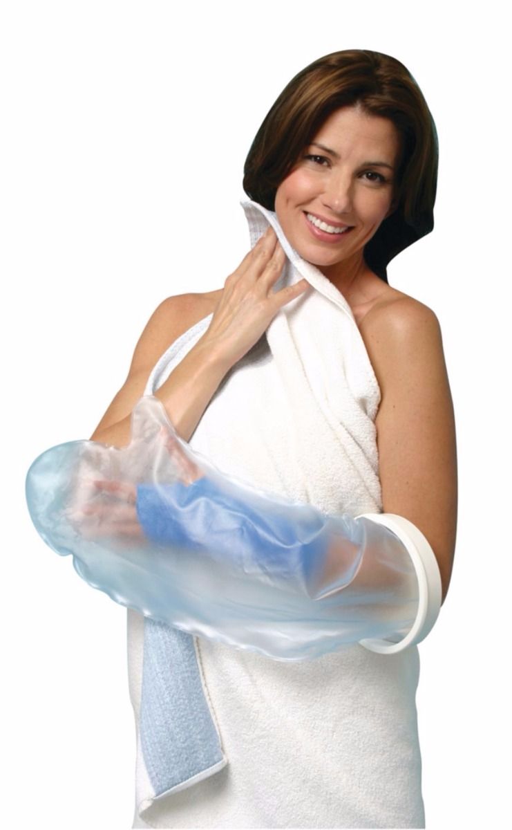Woman smiling while wearing the Carex Cast Protector over her arm cast