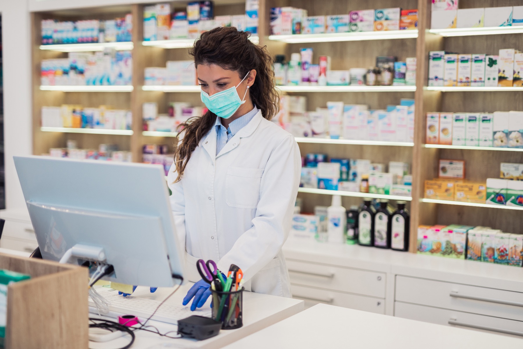 pharmacy worker with mask