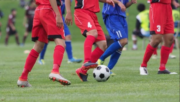 soccer players feet during a game